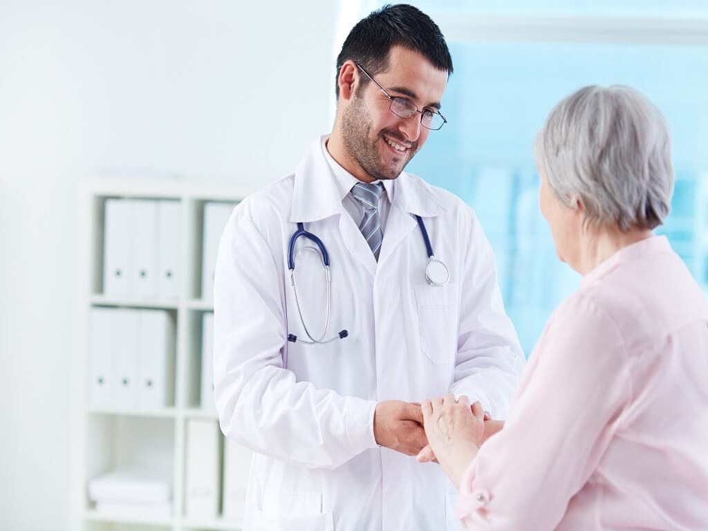 young doctor supporting his patient image